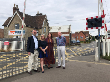 Councillors Dan Sames, Donna Ford and Michael Waine with Victoria Prentis MP at the London Road crossing